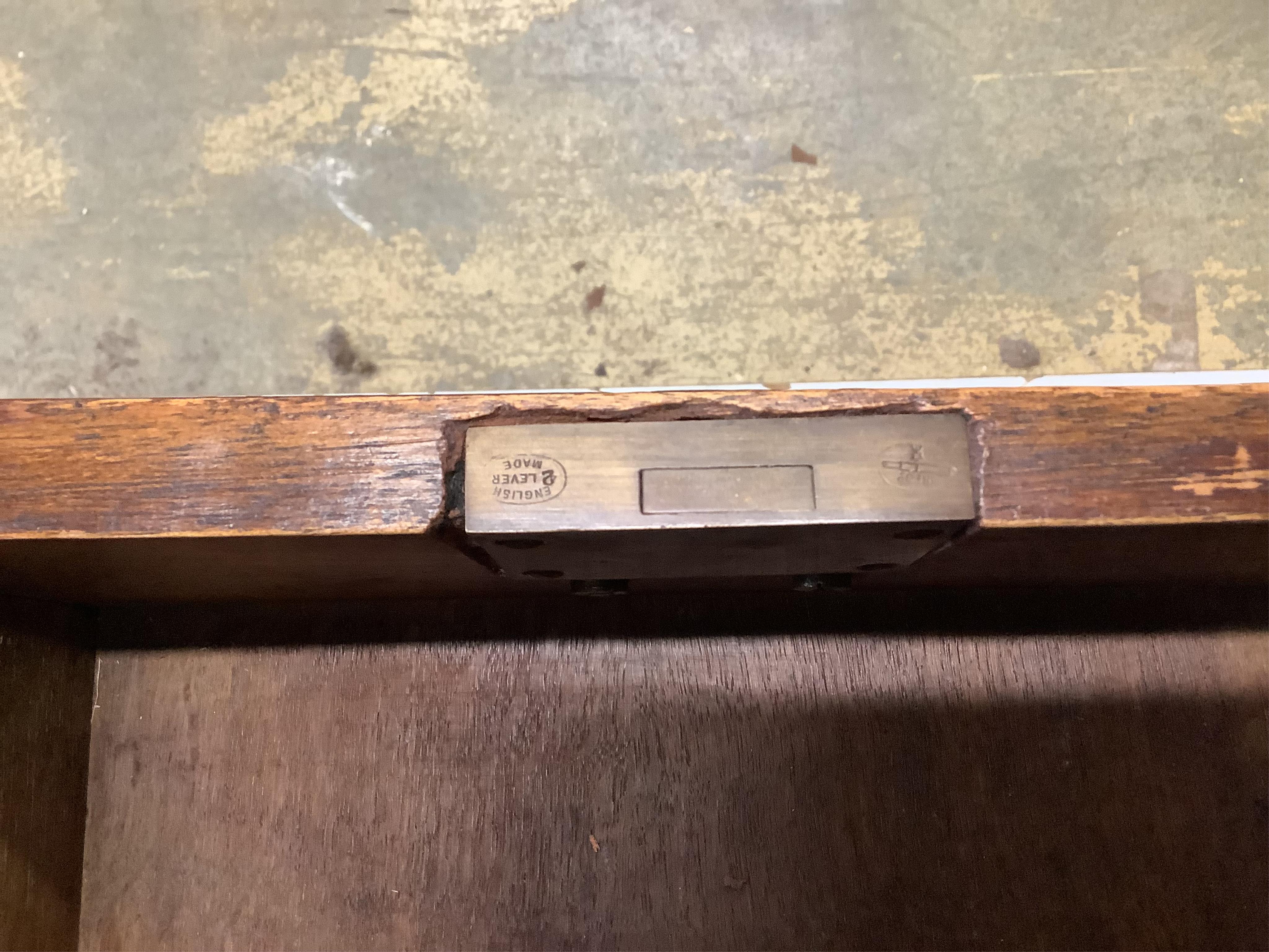 An early Georgian style walnut pedestal desk with inset leather top, width 117cm, depth 71cm, height 77cm. Condition - fair to good